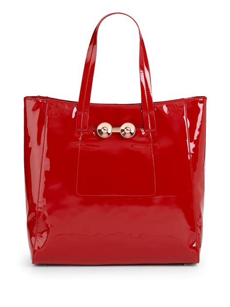 red patent leather tote bag